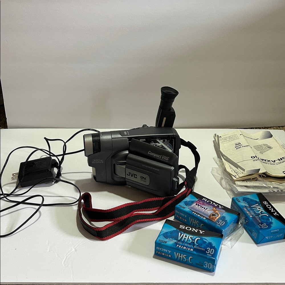 Compact VHS Camcorder in Gray with Red/Black Strap
